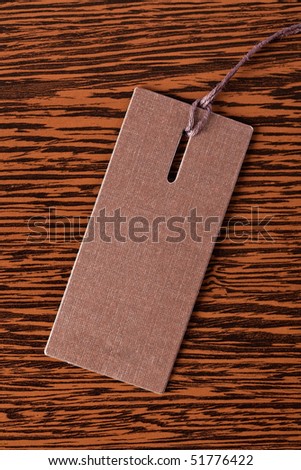 price tag on wooden background