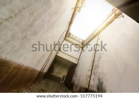 Corridor in the abandoned concrete building