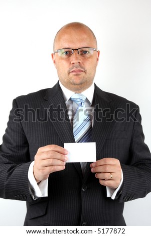 Executive holding a business card