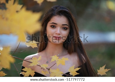 The beautiful girl looking to camera, fall, autumn style photo, yellow leaf love, cute model female, November photo shoot, big awesome eyes 