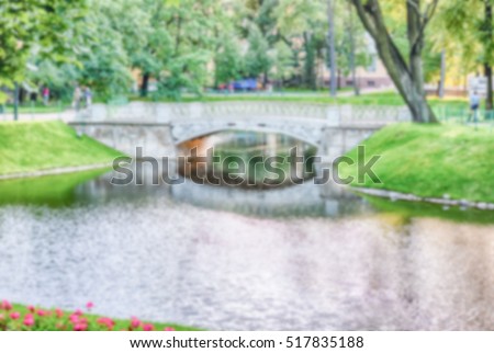 Defocused background of Mikhailovsky Garden in central St. Petersburg, Russia. Intentionally blurred post production for bokeh effect