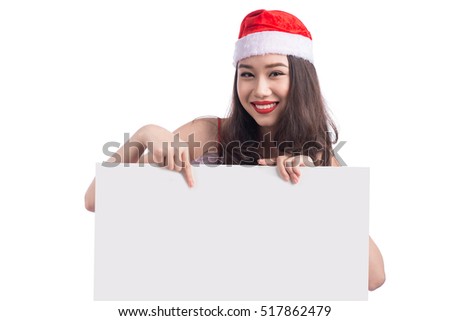 Asian Christmas girl with Santa Claus clothes holding blank sign isolated on white background