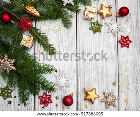 christmas fir tree with decoration on a wooden board