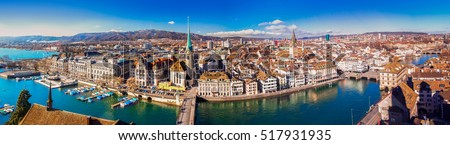 View of historic Zurich city center with famous Fraumunster Church, Limmat river and Zurich lake from Grossmunster Church, Switzerland Royalty-Free Stock Photo #517931935