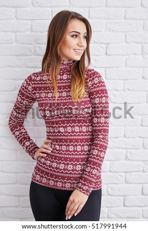 Smiling woman wearing warm sweater