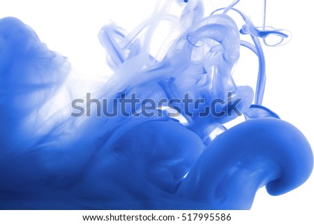 Acrylic colors and ink in water. Abstract background. Isolated on white