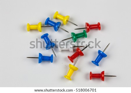 Close up set of colorful  pins isolate on white