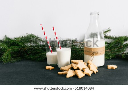 Cookies and milk Christmas themed on the table