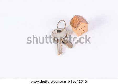House and keyring,  invesment and realestate concept