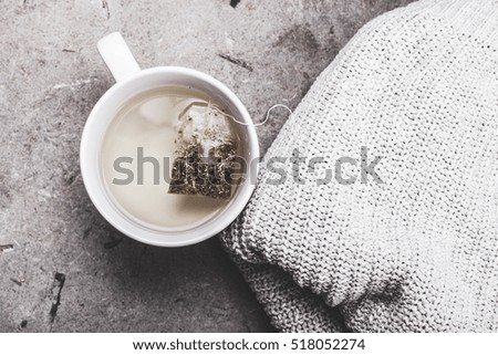 cup of green tea on a concrete background
