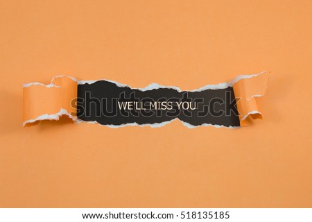 The text We'll Miss You appearing behind torn brown paper Royalty-Free Stock Photo #518135185