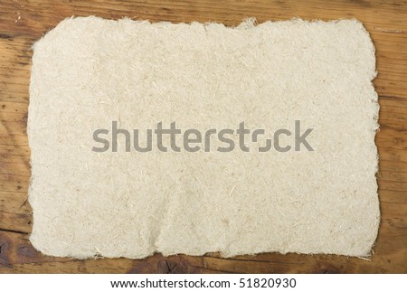 Hand made hemp paper on the table. With space for text. Royalty-Free Stock Photo #51820930