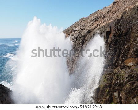 Blowhole with the upward jet of water or marine geyser at La Bufadora, Ensenada, Mexico