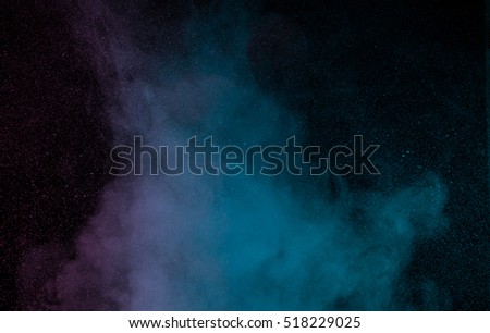 Abstract blue purple water vapor on a black background. Texture. Design elements. Abstract art. Steam the humidifier. Macro shot.