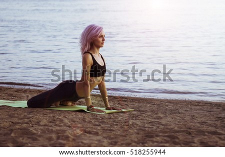 Yoga girl on the beach 