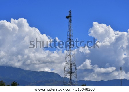 Antenna , mast 
a rod, wire, or other device used to transmit or receive radio or television signals.
