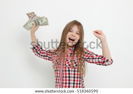 Beautiful caucasian teen girl with cash money USA