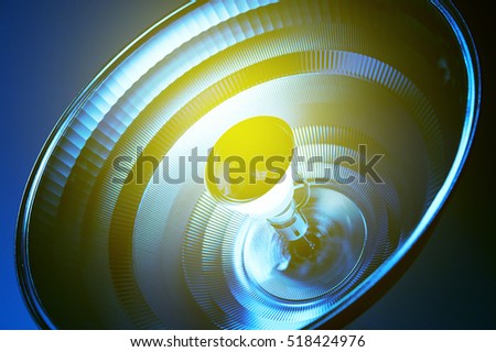 Blue light reflector in medical environment healthcare sterile room with yellow light flare 
