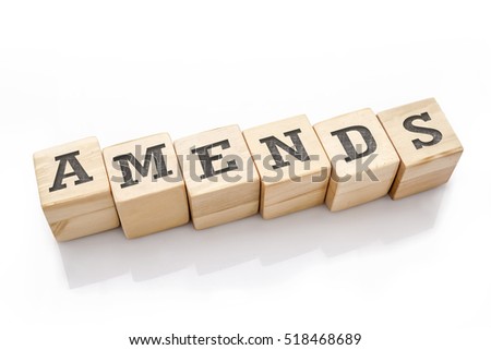 AMENDS word made with building blocks isolated on white