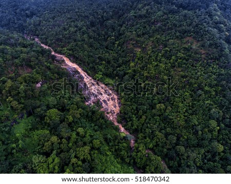 Mae Ya waterfall during the rainy season. The colors would look cloudy A flash flood To explore the need for caution.The Doi Inthanon national park Chiang Mai, Thailand.Aerial view landscape.