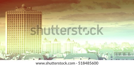 sunny cityscape with tall buildings