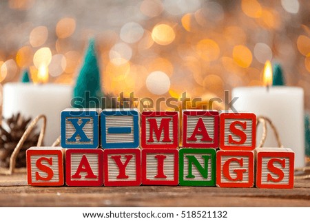 X-Mas Sayings Written With Toy Blocks On Christmas Card Background With Copy Space.