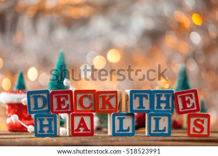 Deck The Halls Written With Toy Blocks On Christmas Card Background With Copy Space.