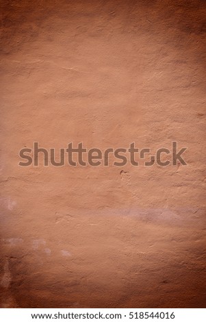 Grunge vignetted wall texture background