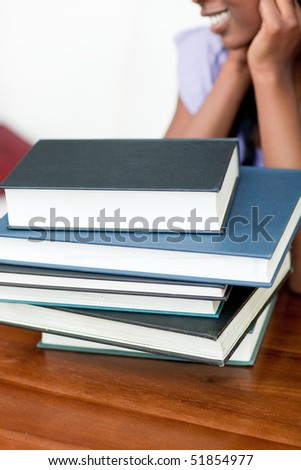 Close-up of a stack of books on a table
