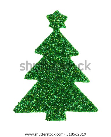 A green glitter Christmas tree sticker isolated on a white background.