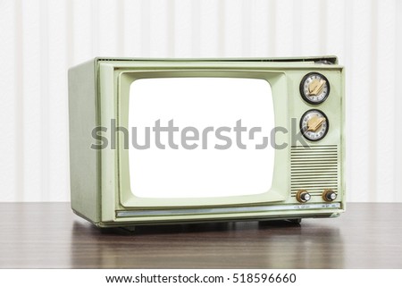 Old green television with cut out screen.