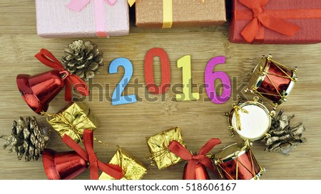 Gift boxes and christmas decoration on wooden table