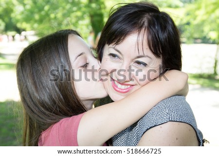 Lovely and kissing mother and daughter
