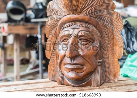 wood carved of indian chief head 