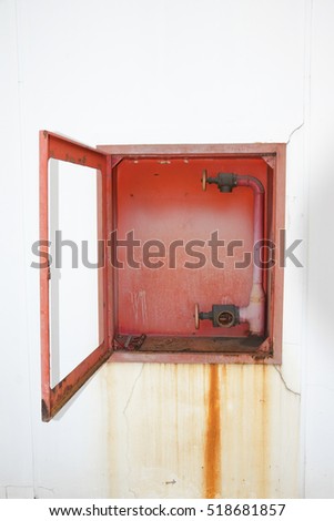 Broken of the old Red fire hose cabinet on the wall - Concept background