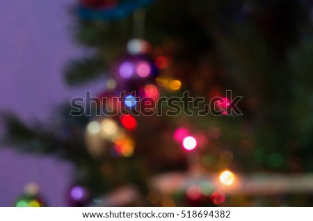 Abstract bokeh from Christmas balls and lights on Christmas tree for abstract background