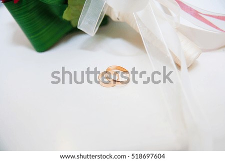 beautiful wedding rings on a white background