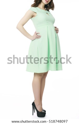 Pregnant woman in a retro dress