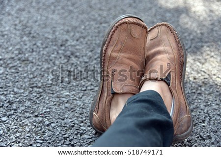 Brown shoes on floor in waiting concept