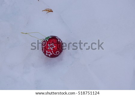 tree toy lying in the snow