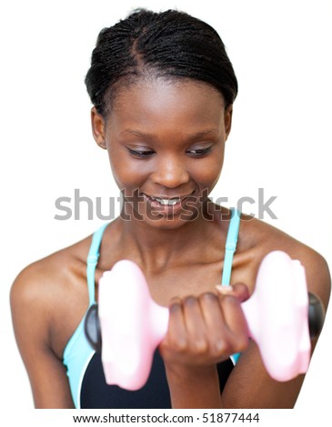 Charming woman working out with dumbbell against a white background