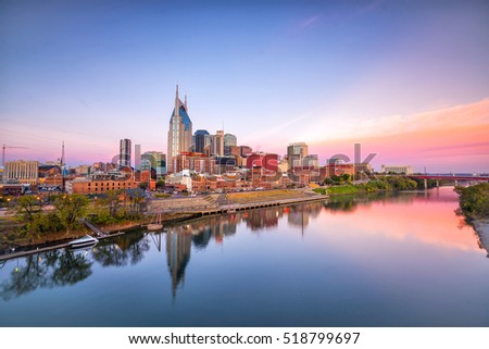 Nashville, Tennessee downtown skyline with Cumberland River in USA Royalty-Free Stock Photo #518799697