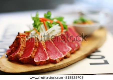 Close up of Tuna Tataki salad. Selective focus.
 Royalty-Free Stock Photo #518825908