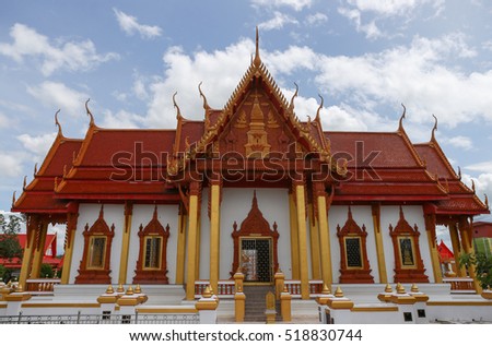 outdoor panoramic view of well attractive decorative Thai retro style buddhist temple in Nakhon Panom, Thailand  under summer sunny cloudy sky atmosphere with nobody presents in the picture frame.