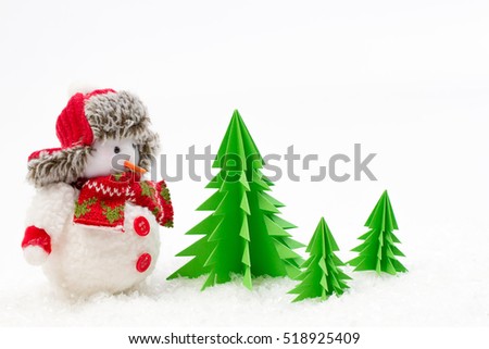 Christmas decoration toy snowman with origami tree isolated on white background
