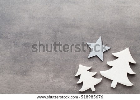 Christmas background. White tree decorations on a gray background. Deer. Spruce. Star. Angel.