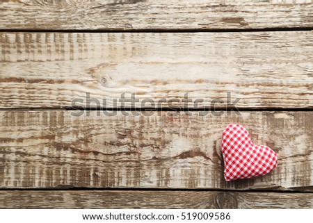 Love heart on a grey wooden table