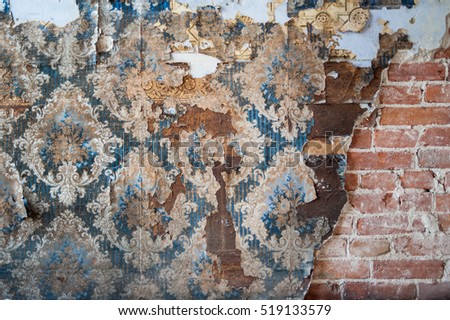 Vintage textures: old wallpaper, peeling paint, brick wall and layers of different colorful backgrounds. Royalty-Free Stock Photo #519133579