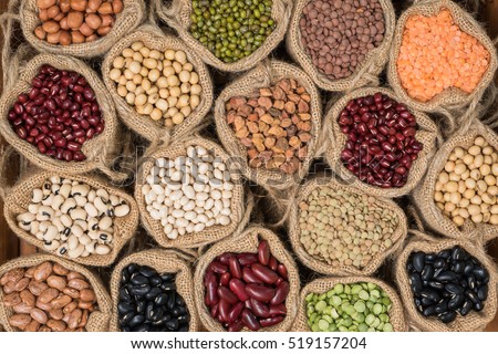 Various dry legumes in a sack cloth, Different dry legumes for background Royalty-Free Stock Photo #519157204