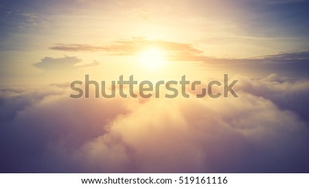 Sunny sky abstract background, beautiful cloudscape, on the heaven, view over white fluffy clouds, freedom concept.soft focus.Vintage color